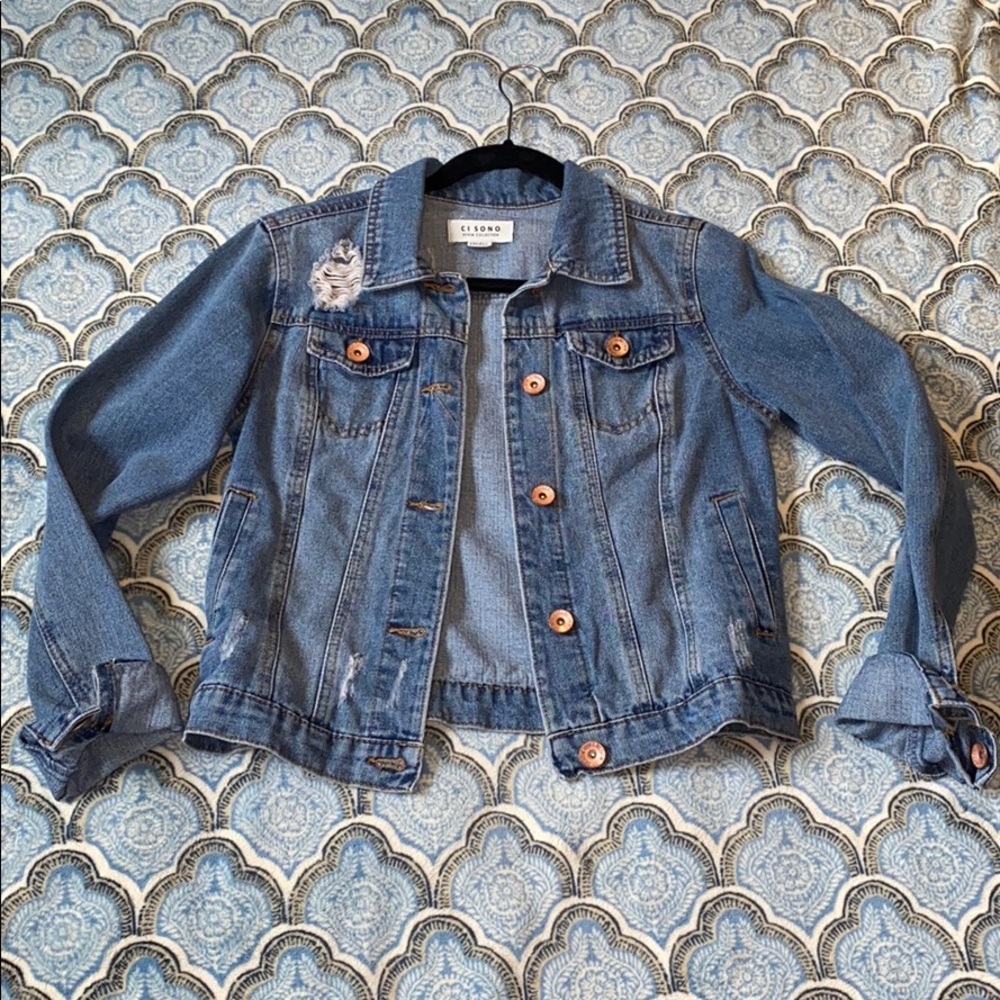 Distressed jean jacket